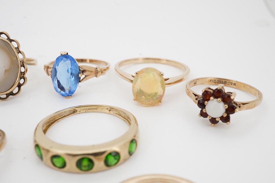 A group of assorted modern 9ct and gem set rings including opal and seed pearl and turquoise and one other 10k ring. Condition - fair to good